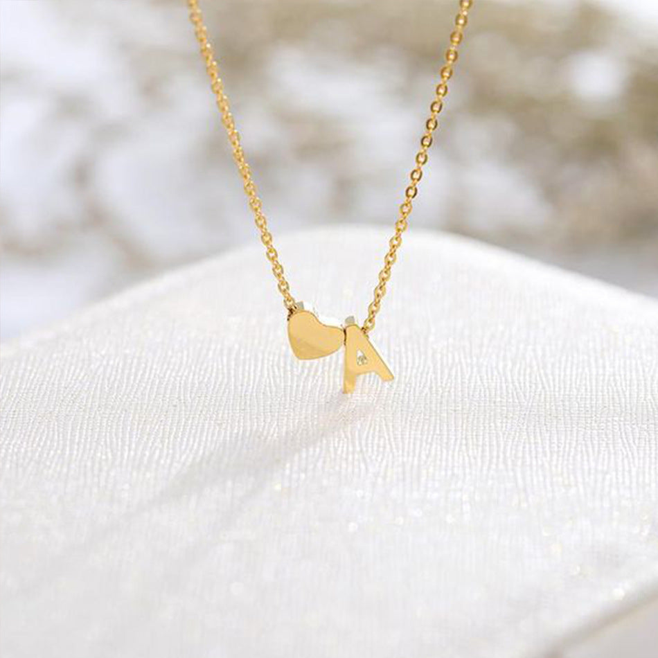 Ria™ | Collana con cuore e iniziali