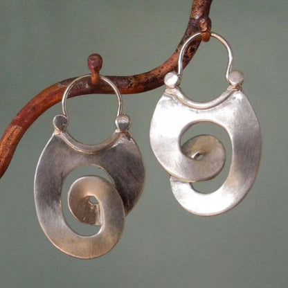 Boucles d'oreilles rétro en argent aux formes irrégulières