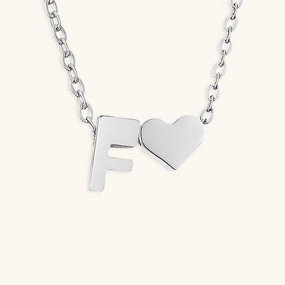 Ria™ | Collana con cuore e iniziali