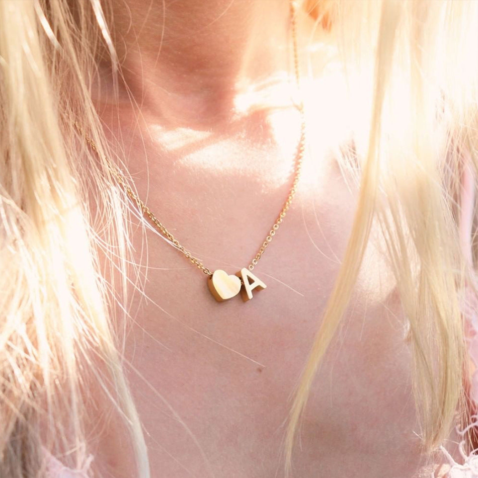 Ria™ | Collana con cuore e iniziali