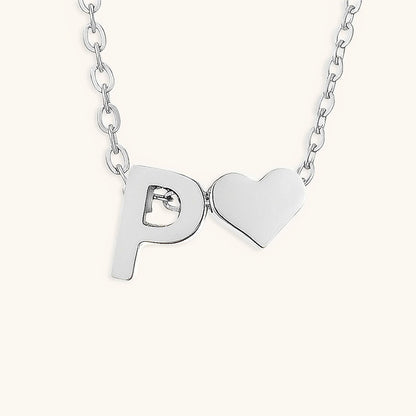 Ria™ | Collana con cuore e iniziali