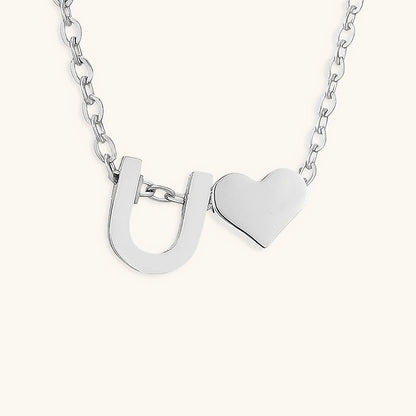 Ria™ | Collana con cuore e iniziali