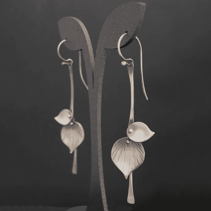Boucles d'oreilles vintage en argent feuilleté