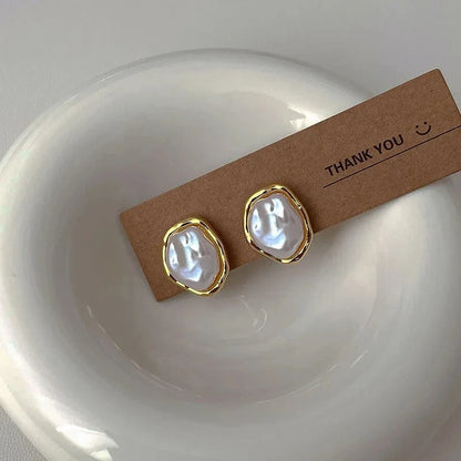 Élégantes Boucles d'Oreilles en Perles de Carmen