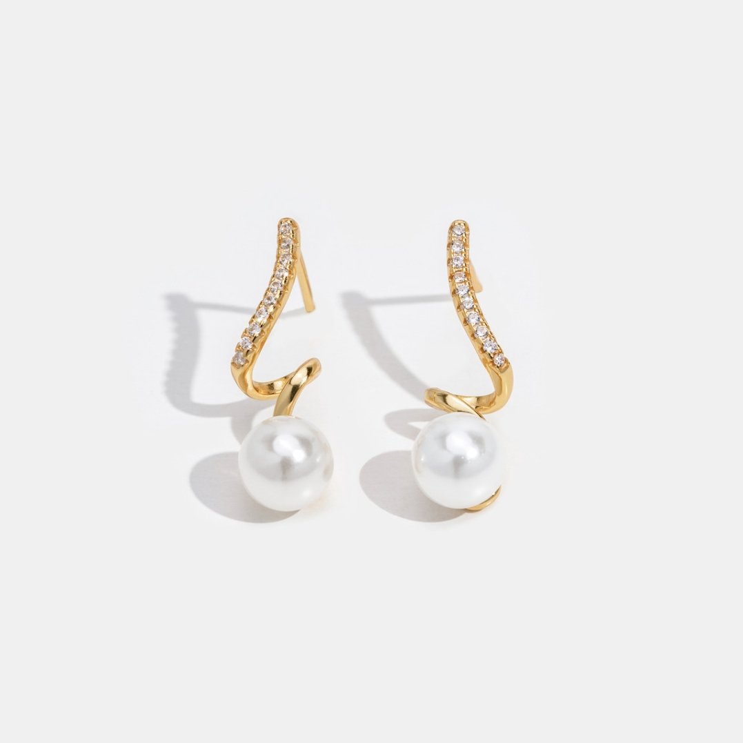 Tamara™ | Boucles d’oreilles ondulées nacrées